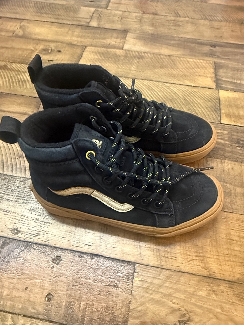 Vans Kids Black High-Top Sneakers with Gum Sole and Gold Stripe